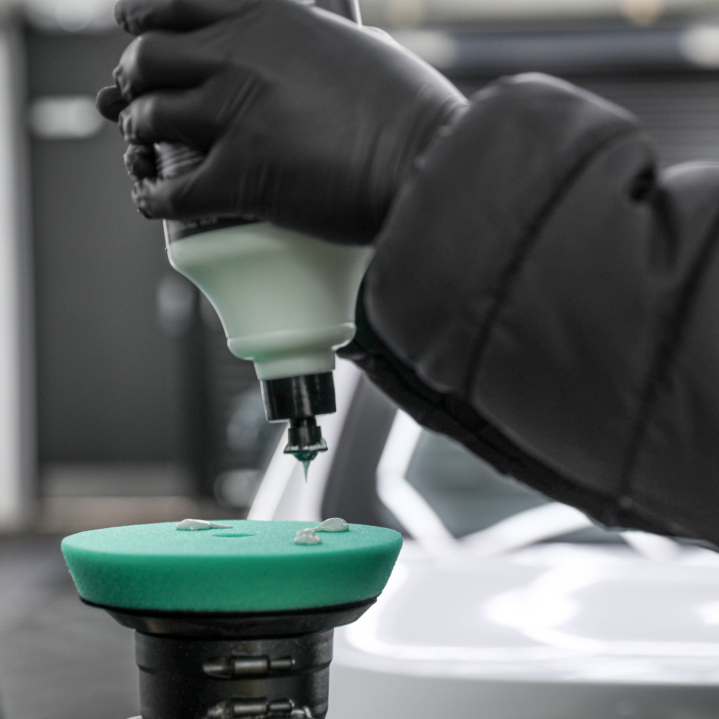 heavy cutting compound being applied to polishing pad