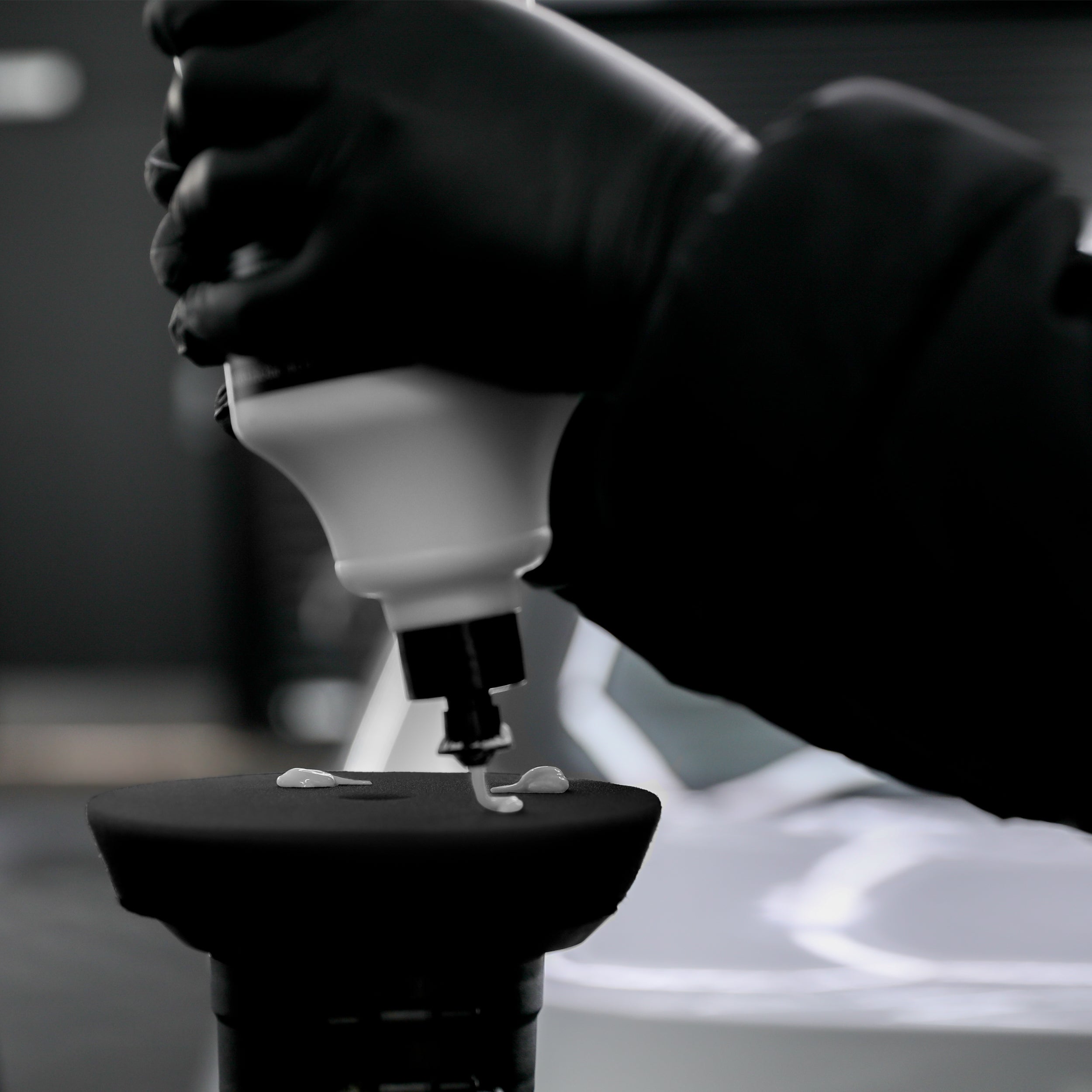 fine-cutting-compound-being-applied-to-polishing-pad