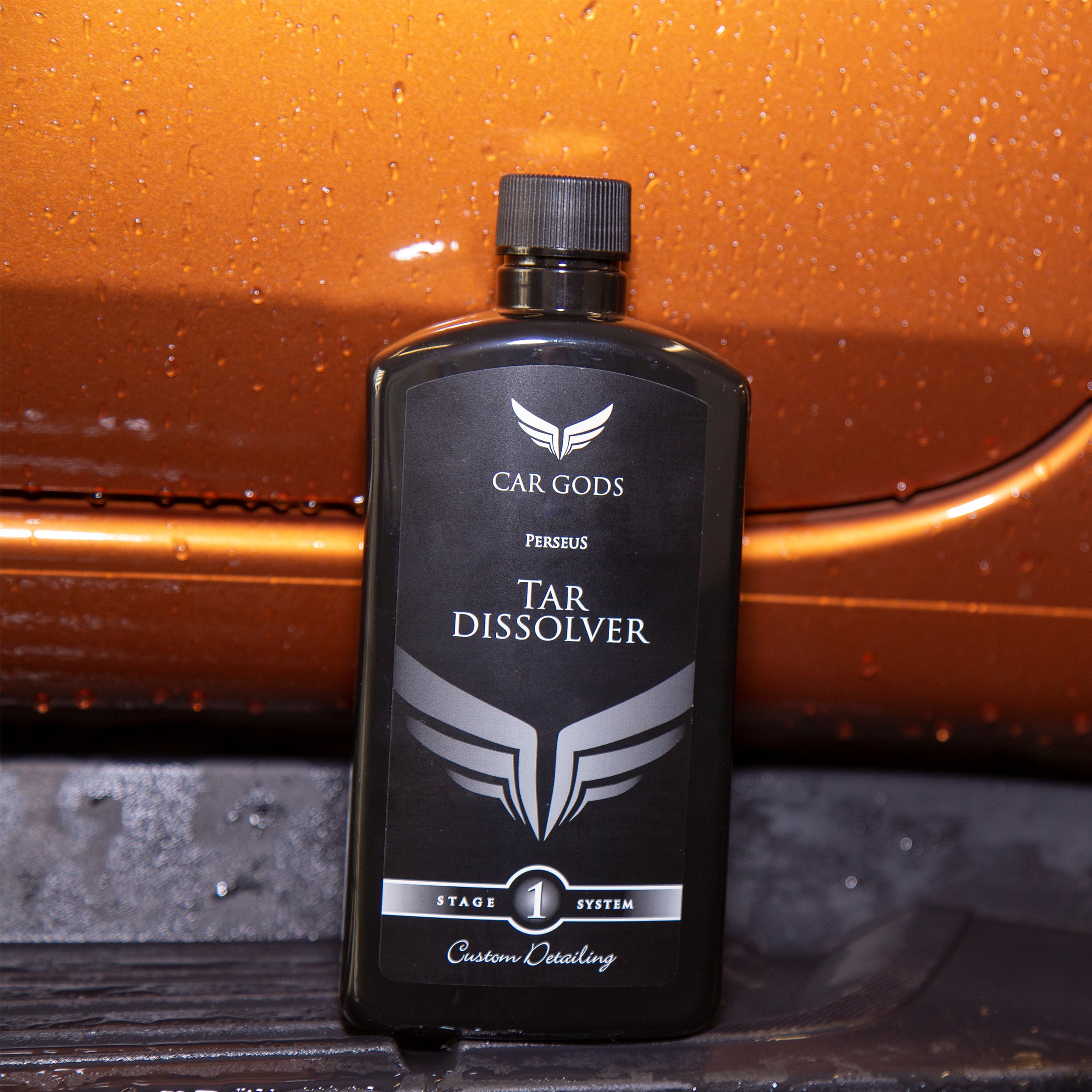Tar dissolver next to cleaned car