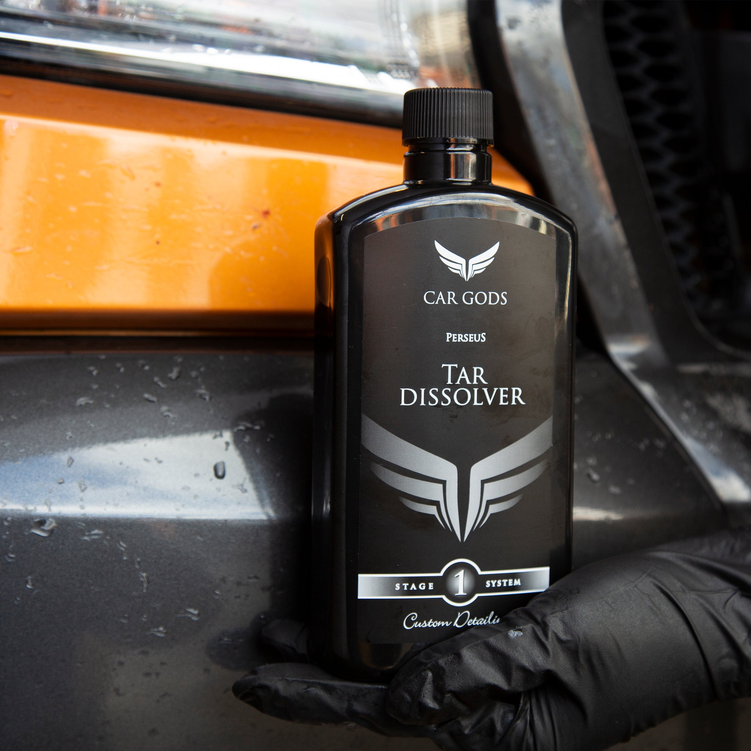 Tar dissolver next to cleaned car
