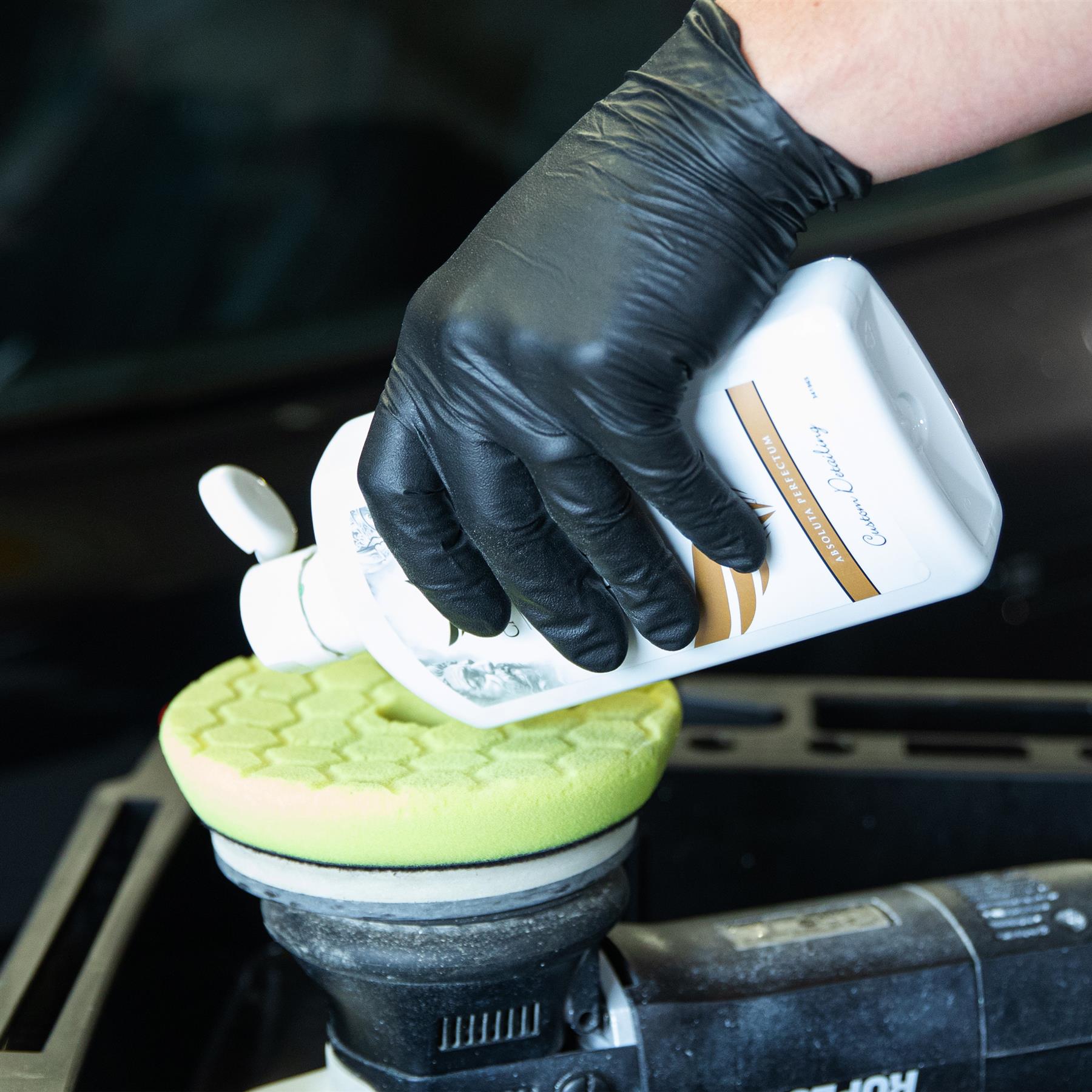 Pure Compound being applied to a rotary polisher
