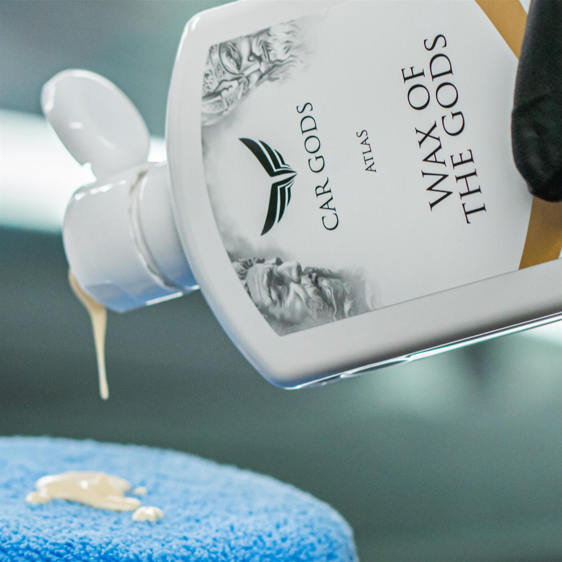 wax of the gods being applied to a blue applicator pad