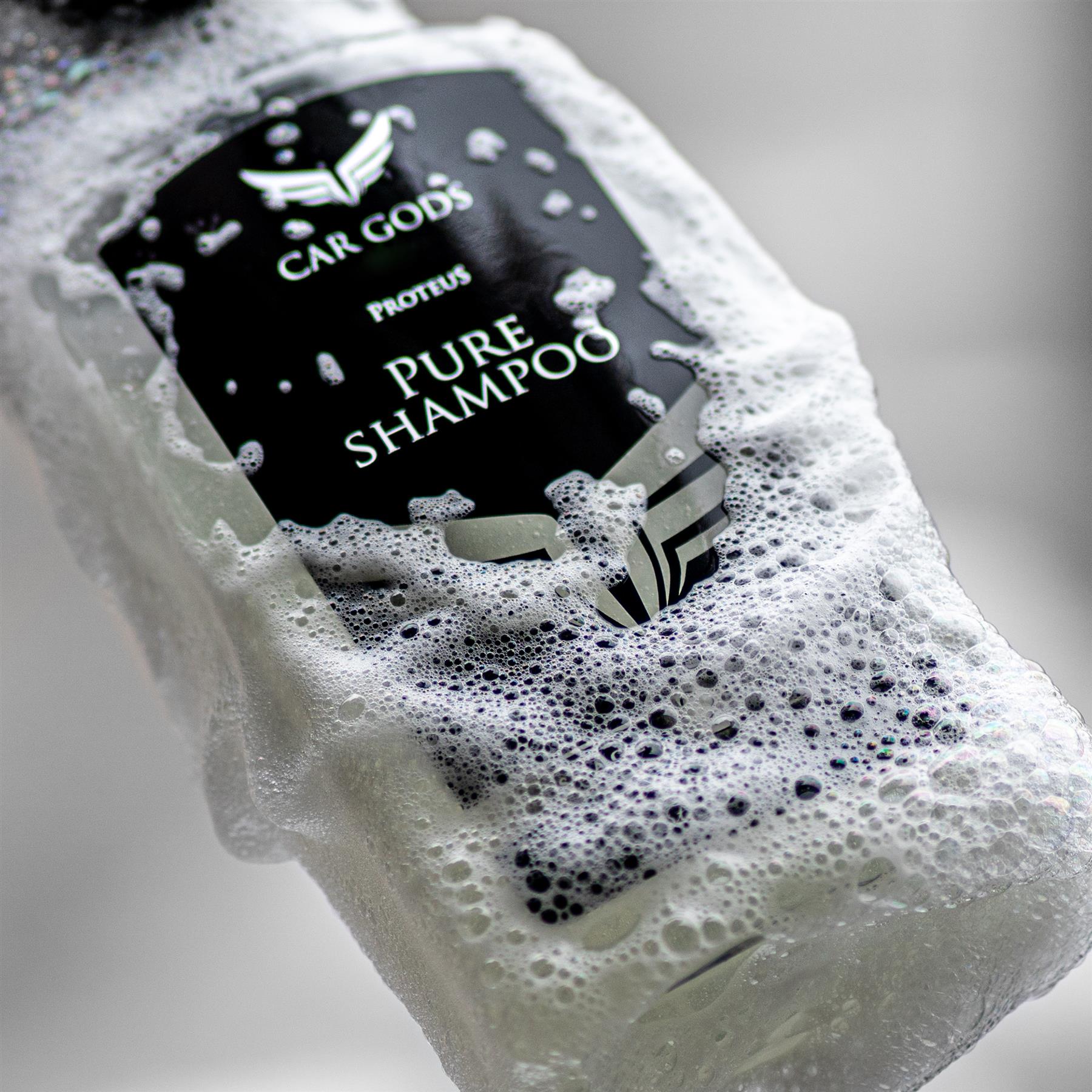 Pure shampoo bottle covered in suds