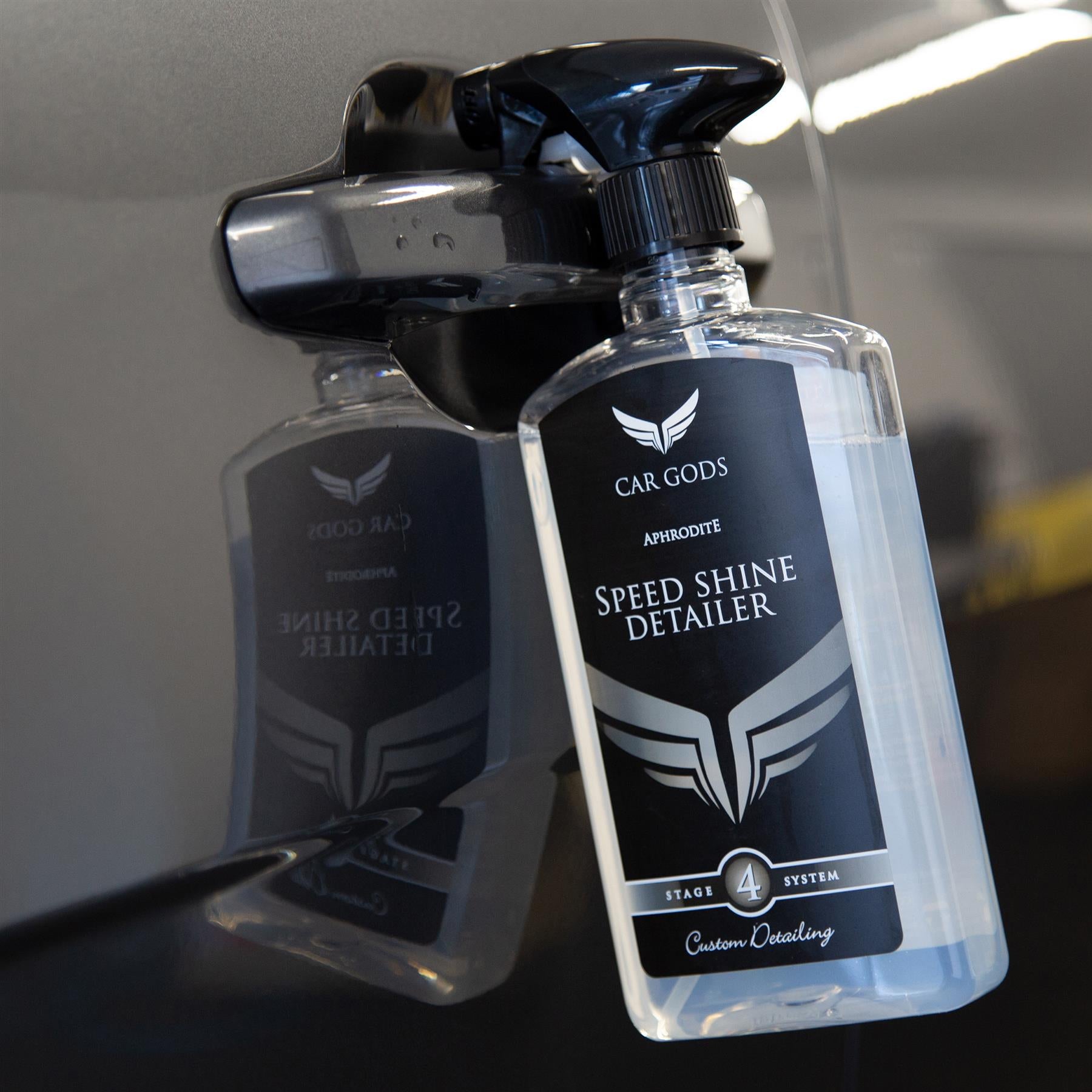 Speed shine detailer bottle hanging on car door handle