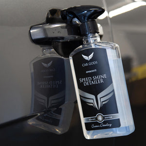 Speed shine detailer bottle hanging on car door handle