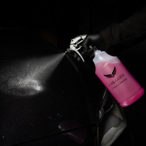 Applying bug and sap remover with a professional spray bottle