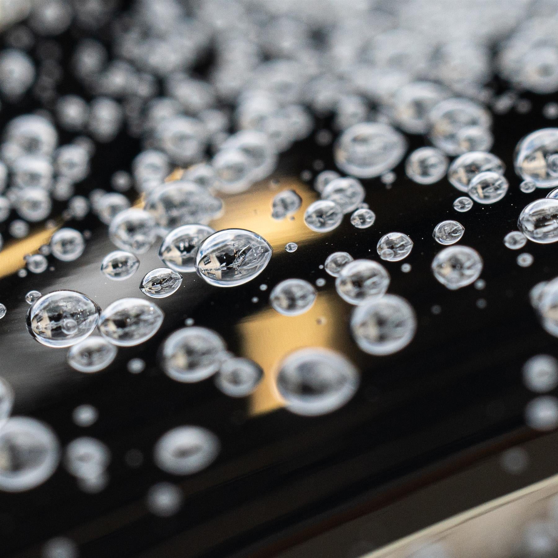Water beading on the window surface