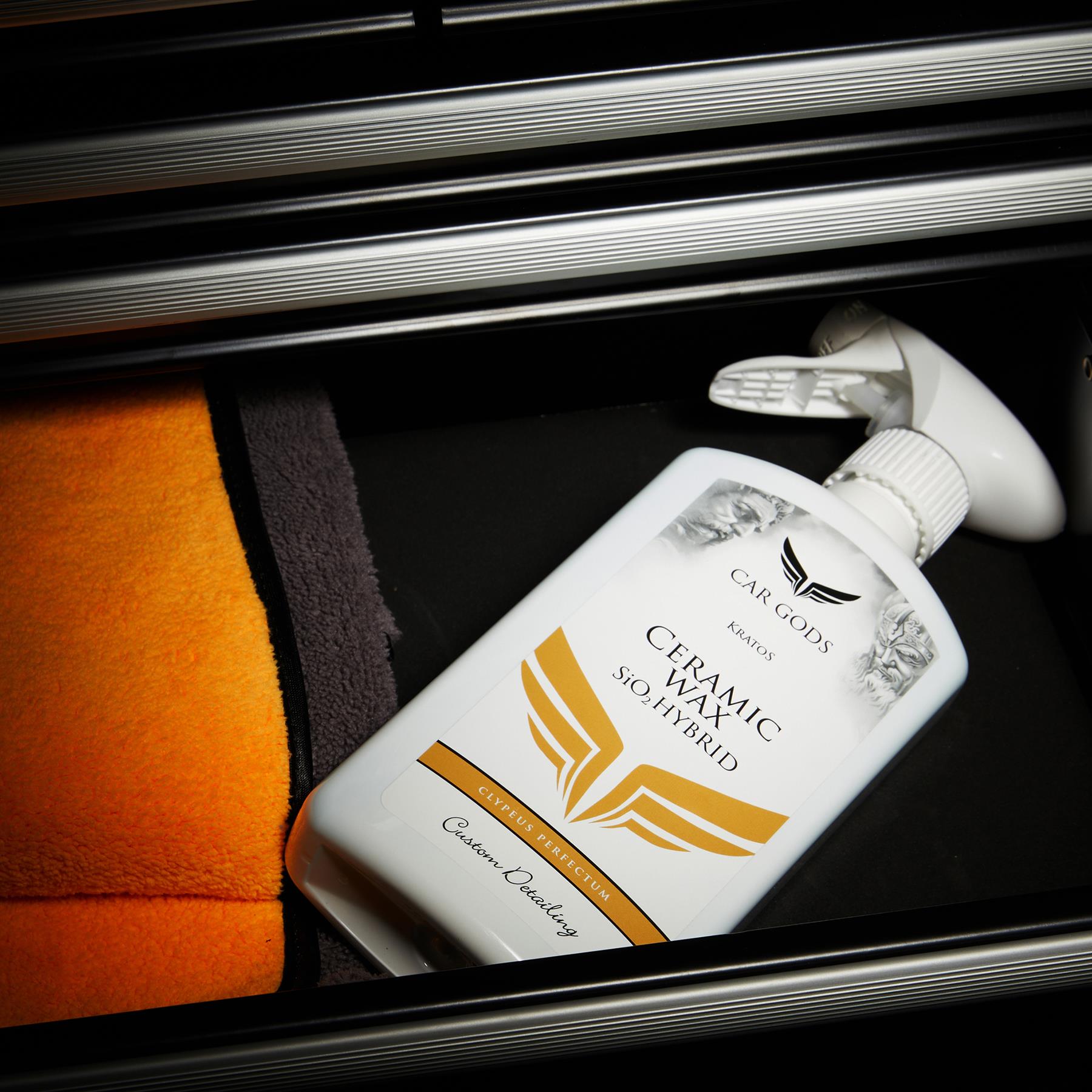 Sio2 ceramic spray wax and detailer's microfibre cloth inside a toolbox drawer